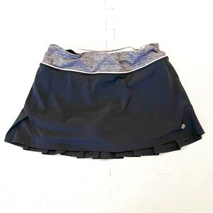 Lululemon Pace Setter Skirt Black with Heathered Waist Pink Trim Size 4